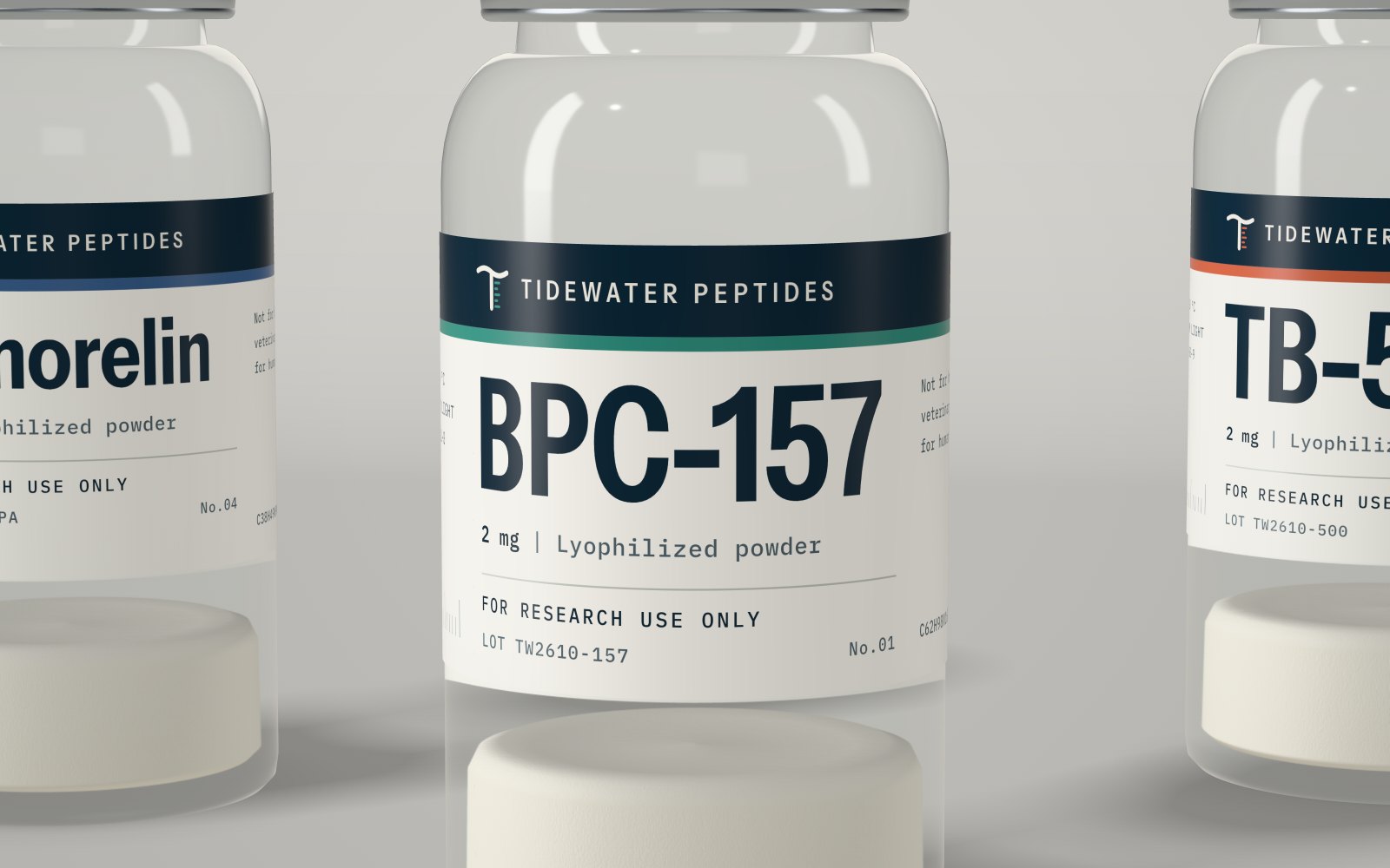 Close view of a BPC-157 vial label showing the lot number TW2610-157 and the research use only line